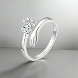 Adjustable Paw-Shaped Ring in Sterling Silver – Hand-in-Paw Design